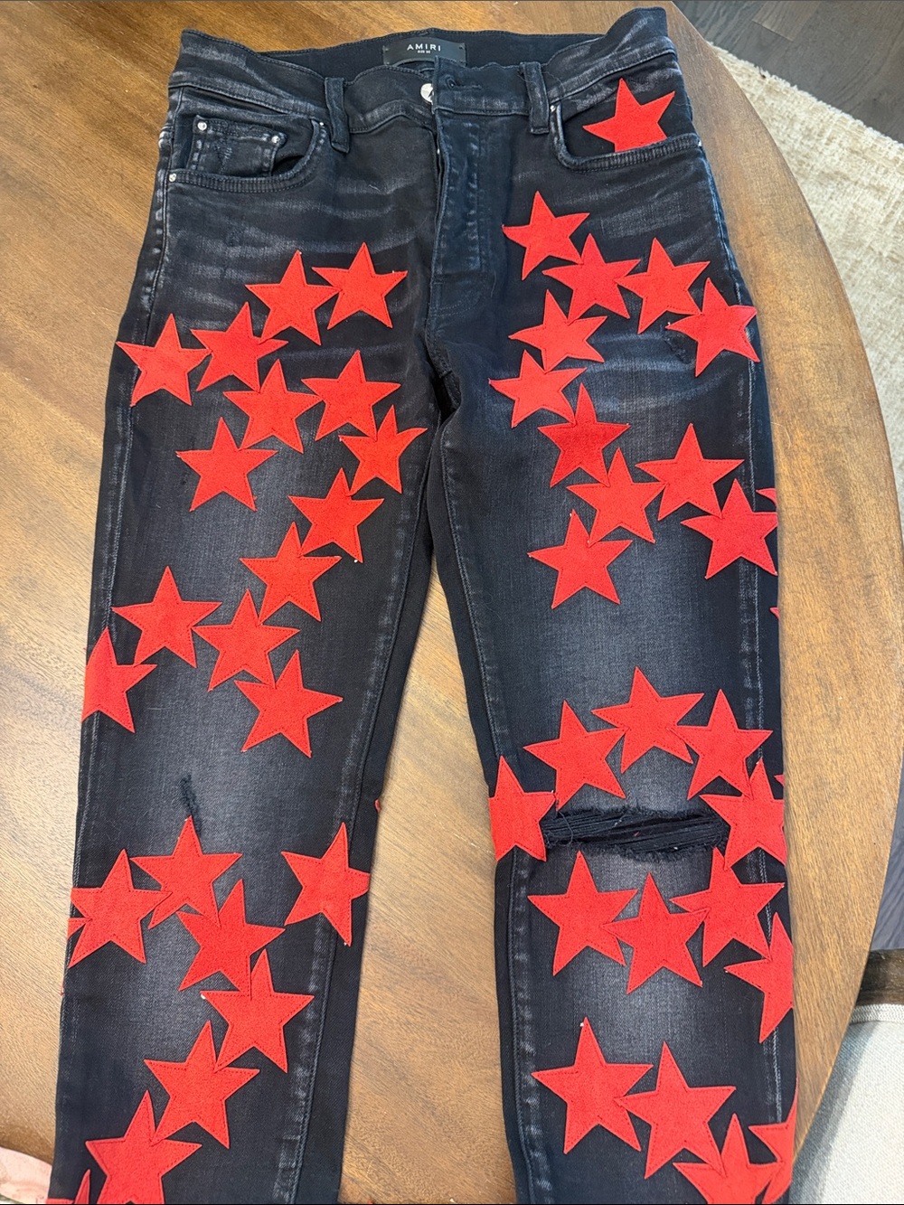 AMIRI Black Skinny Jeans with Red Star Appliqués